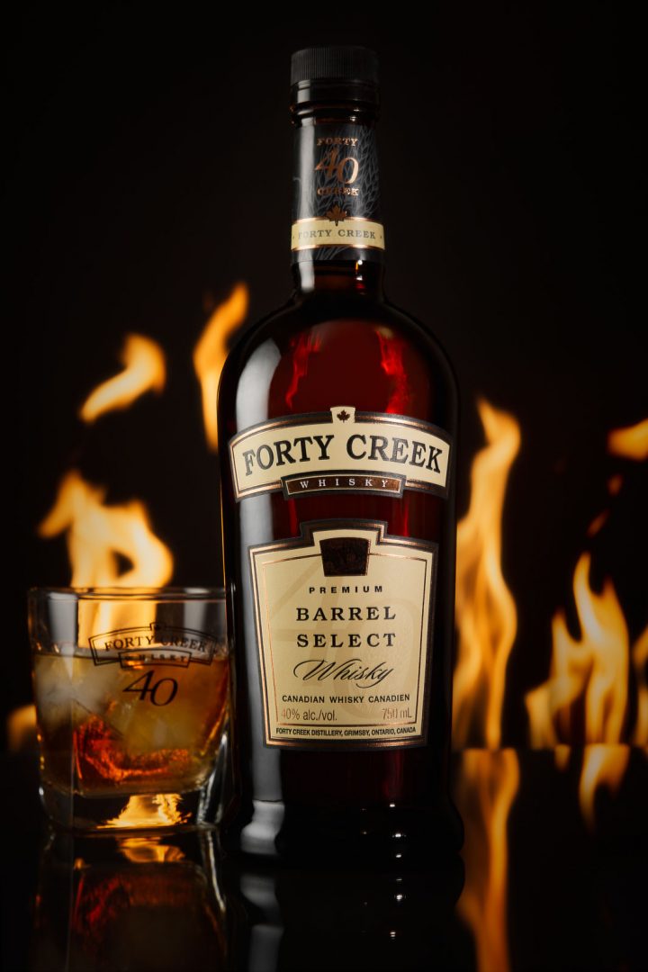 Forty Creek Whiskey Fire Product Photo in studio with black fire backdrop By Brandon Marsh Photography in Guelph, Ontario Canada
